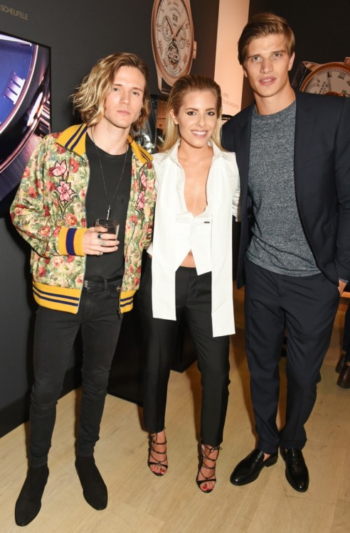 LONDON, ENGLAND - OCTOBER 11: (L to R) Dougie Poynter, Mollie King and Toby Huntington-Whiteley attend the cocktail opening of the Chopard exhibition 'L.U.C - L'art d'une Manufacture' at Phillips Gallery on October 11, 2016 in London, England. Pic Credit: Dave Benett